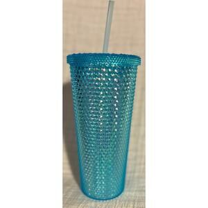 Blue studded drinking cup